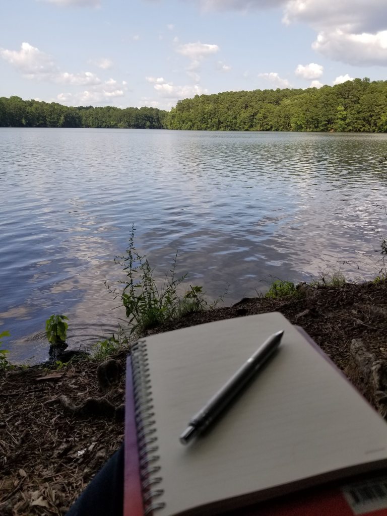notebook at water's edge